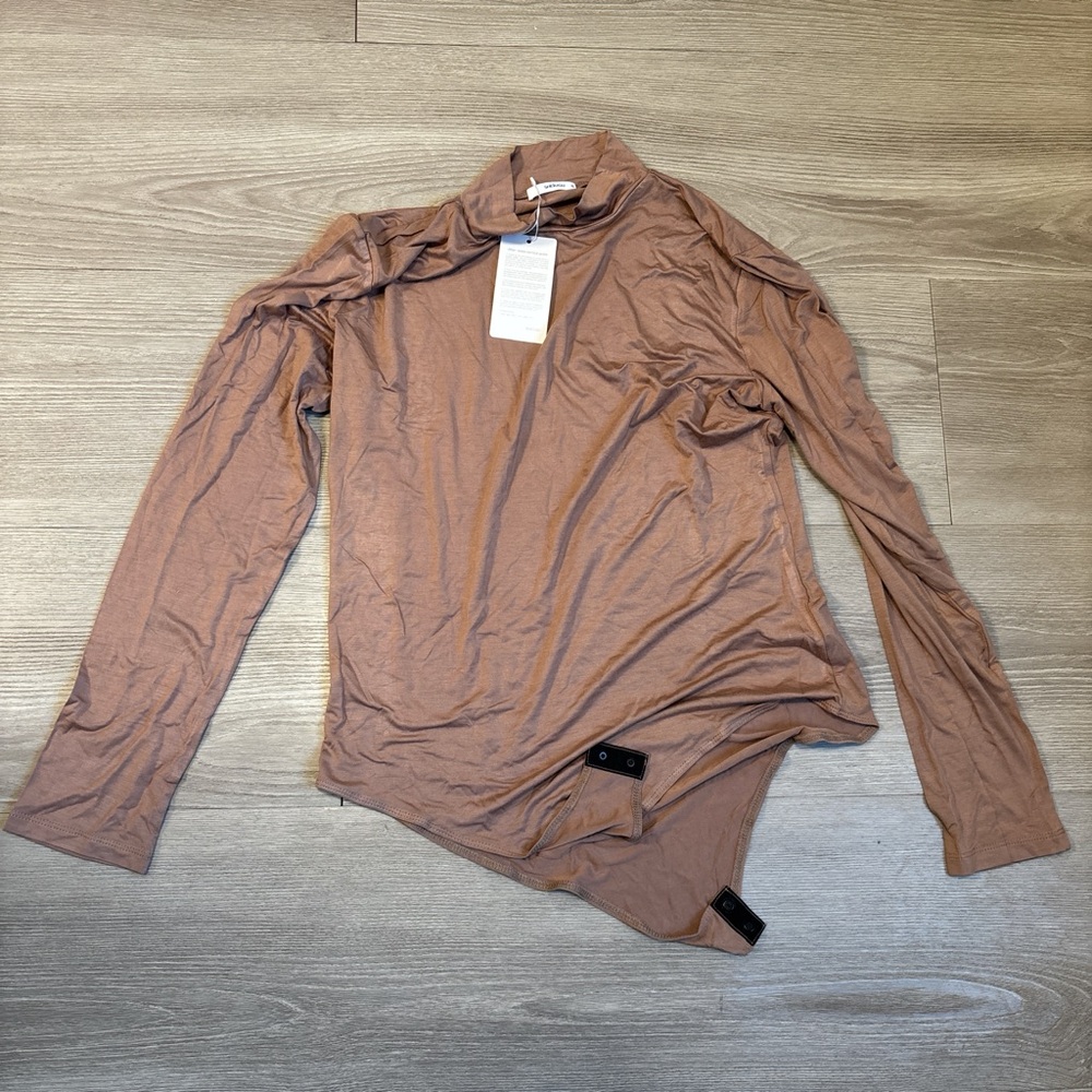 Amazon beige bodysuit